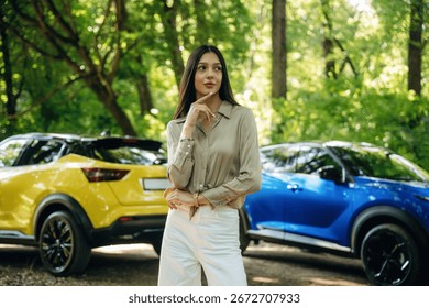 Thinking, thoughtful expression, choice. Young woman is in the forest with two cars.