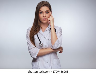 Thinking Woman Doctor Dressed White Medical Uniform Isolated Studio Portrait.