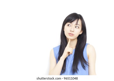 thinking woman looking up, isolated on white background