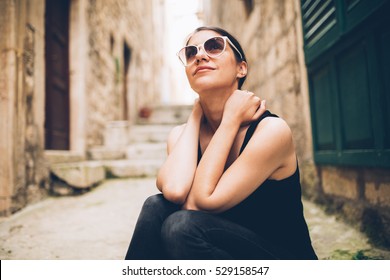 Thinking Woman Sitting Pensive Contemplating.Thinking Woman Looking Up.Challenge Concept.Young Brunette Looking Curious.Smiling Content European Woman.Pretty Face Girl Ready For Future Adventures