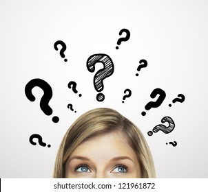 thinking women with question mark on white background - Shutterstock ID 121961872