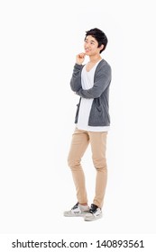 Thinking Young Asian Man Isolated On White Background.