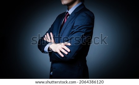 Thinking young businessman. Serious business concept.