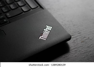 Thinkpad Logo On Laptop On Black Wooden Table