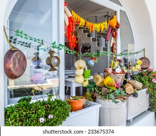 THIRA, SANTORINI - AUGUST 13, 2013: Traditional Greek Shop With Different Food And Taverna In Thira Town. Thira Town Is The Capital Of Santorini Island.