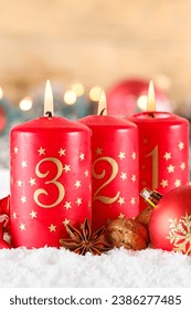 Third 3rd Sunday in advent with burning candle Christmas time decoration deco with copyspace copy space portrait format