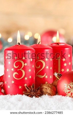 Third 3rd Sunday in advent with burning candle Christmas time decoration deco with copyspace copy space portrait format