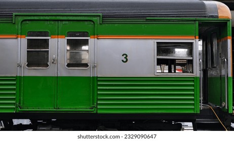 Third class passenger car, window and door open under the drizzle