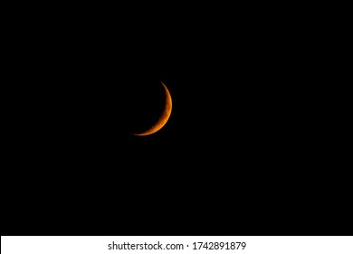 The Third or Last Quarter Moon is also called a Half Moon on golden color 2020: The half lunar glow in the night sky and evening people to see super moon on lock down. Earth half lunar moon 2020.