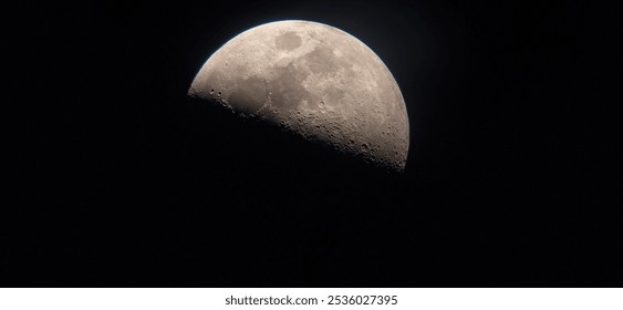 The Third Quarter Moon is when the opposite half of the Moon is illuminated compared to the First Quarter. Whether the lit up half appears on the left or right depends on where you are on Earth. - Powered by Shutterstock