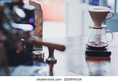 Third wave coffee brewing method: V60 coffee dripping iview from a vintage coffee shop. - Shutterstock ID 2020954154