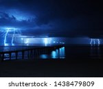 The third wave of lightning during a summer thunderstorm over Port Noarlunga, Adelaide, South Australia during November 2018, about 1am, 