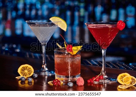 thirst quenching cocktails with fresh decorations on counter with bar backdrop, concept