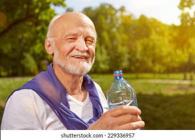 Thirsty Senior Man Drinking Fresh Water After Sports