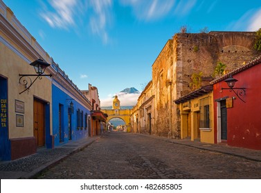 A thirty seconds exposure of the historic center of Antigua at sunrise, Guatemala. Translation text left: "textura" = texture; "cuida tu planeta" = Take care of your planet. - Powered by Shutterstock