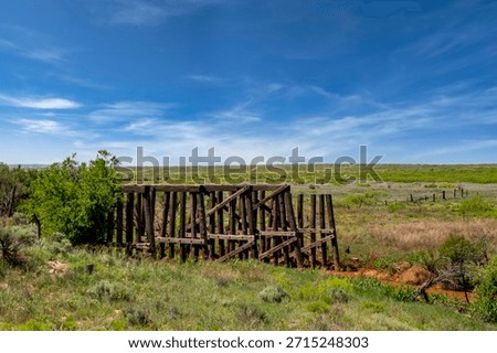 This abandoned timber stringer bridge, spanning San Jon Creek in Quay County, New Mexico, once carried the Chicago, Rock Island and Pacific Railroad.