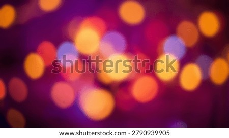 This abstract image features a mesmerizing display of bokeh lights, with vibrant colors and soft blurs creating a visually appealing and dynamic composition. The image is perfect for backgrounds and artistic projects.