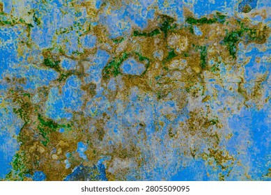 This abstract texture features a weathered blue wall covered with natural moss and aged paint, digitally enhanced to resemble an aerial map or satellite view of a rugged landscape. Rich blue, green, and earthy brown tones create a unique grunge background suitable for graphic design, posters, websites, presentations, and creative projects.
