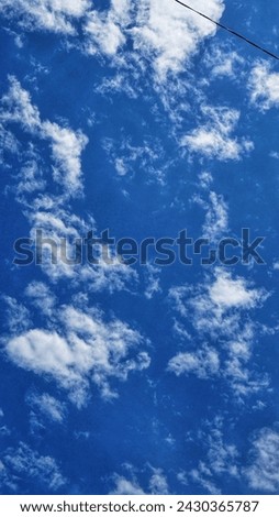 This afternoon the weather is very sunny, the combination of clouds and sky looks so beautiful above the sky