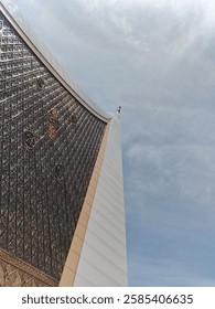 This is the appearance of one corner of a building with a traditional concept, the peak of this corner of the building is quite high and looks like it will penetrate the clouds.