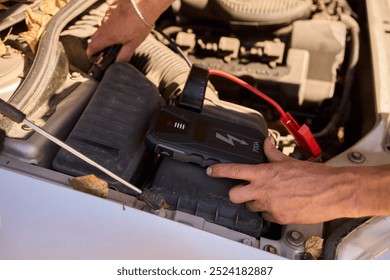 This article offers a practical view on using a portable jump starter in a car engine for emergency efficiency