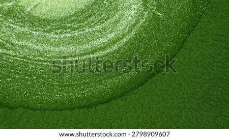 This artwork features a blend of green tones created with alcohol ink. The design captures fluid movement and texture. The focus is on the intricate patterns formed by the colors interacting.