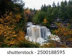 This is an autumn view of the roaring Blackwater Falls along the Blackwater River within Blackwater Falls State Park in West Virginia.