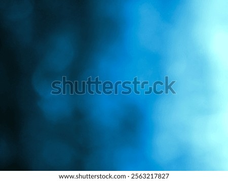 This background features deep, rich shades of blue with soft bokeh effects, evoking a tranquil and ethereal underwater or twilight atmosphere.