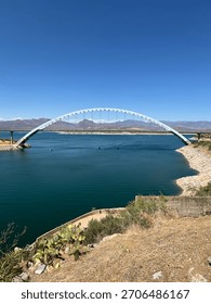 This beautiful blue structure, spans the gap across Theodore Roosevelt Lake.