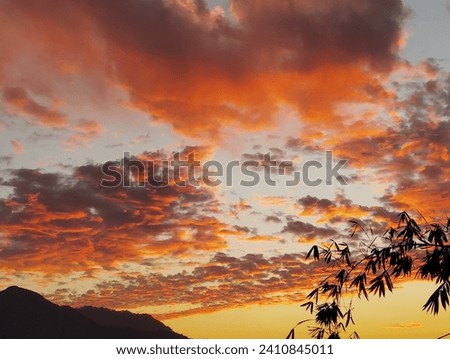 This is the beauty of nature, This is the scenario of sunset. In this image, all the clouds are in reddies, and form a beautiful image, This can be used as wallpaper for mobile phone or for a computer