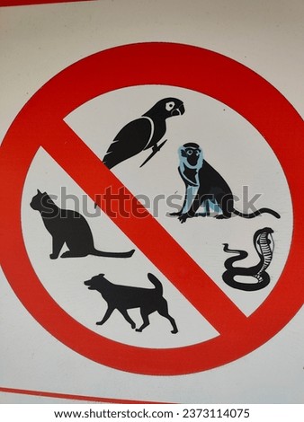 this board sign represents that pets are not allowed....pets restricted zone