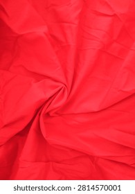 This is a bright red polyester fabric material.
This fabric is often used to make dresses