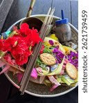 This is canang for pray in bali ,hindu people us this few flower and dupa and few chiki or biskuit and arak berem , bali indonesia 
