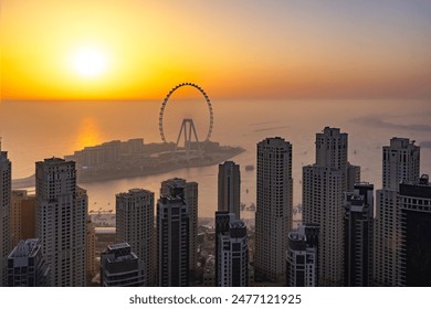This captivating image showcases the vibrant energy of Dubai's Bluewaters Island,
 a man-made marvel offering a unique blend of leisure, entertainment, and stunning cityscapes.