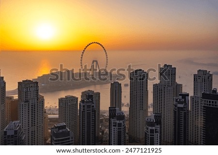 This captivating image showcases the vibrant energy of Dubai's Bluewaters Island,
 a man-made marvel offering a unique blend of leisure, entertainment, and stunning cityscapes.