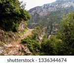 This is a capture of an old walking route north Lebanon which can be interesting for touristic exploration and hikers, taken in spring 2006 and you can see the huge mountains in the background. 