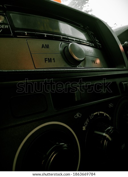This is a car radio\
and car ac regulator