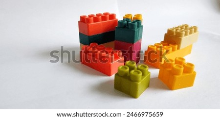 This is a children's play object made of plastic called Lego with various colors