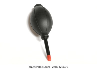 This cleaning tool is shaped like a pump made of rubber combined with a small pipe to release air. The blower is very effective for cleaning dust and dirt that sticks between DSLR camera bodies and le