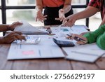 This collaborative scene portrays team members passionately discussing project documents with a focus on analytics and strategy, highlighting the significance of teamwork and communication.