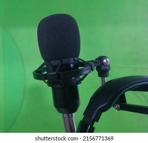 This Is A Condenser Mic On A Green Background,