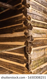 This is a corner view of logs of a log cabin closeup.