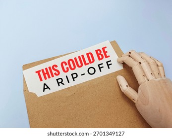 This Could Be A Rip-Off label on brown envelope, symbolizing warning, caution, fraud alert, consumer awareness, and potential scam concept.