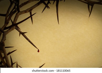This Crown of Thorns with drop of blood against parchment paper represents Jesus's Crucifixion on the Cross, dying and then rising on Easter Sunday. 