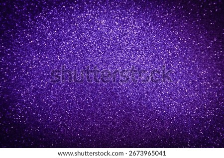 This deep purple glitter background features a dramatic vignette, with a brightly sparkling center that fades into mysterious, dark edges.