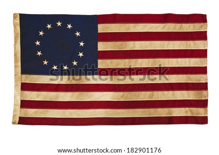 This design for the American flag, popularly attributed to Betsy Ross, was designed during the American Revolutionary War features 13 stars to represent the original 13 colonies. 