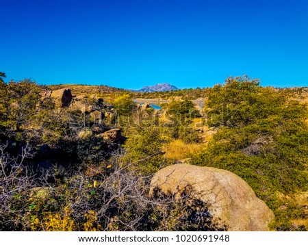 This distant image of Granite Mountain was captured in the Watson Lake area of the Granite Dells in Prescott, Arizona.