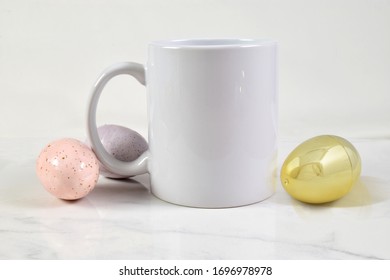This Easter inspired mock up features an 11 ounce coffee mug surrounded by gold, pink and purple Easter eggs. 