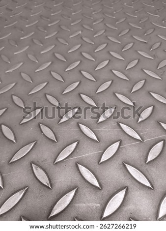 this is an elevator floor, with stainles material and embossed motifs so as not to be slippery and strong to withstand the load 
