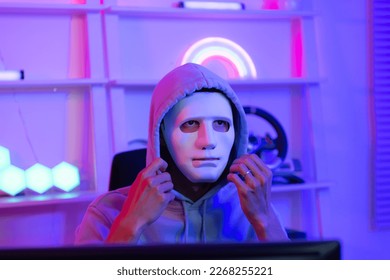 This is the face of a hacker who is knowledgeable with operating systems and other programs. He will exploit flaws and breach the computer system to cause damage.